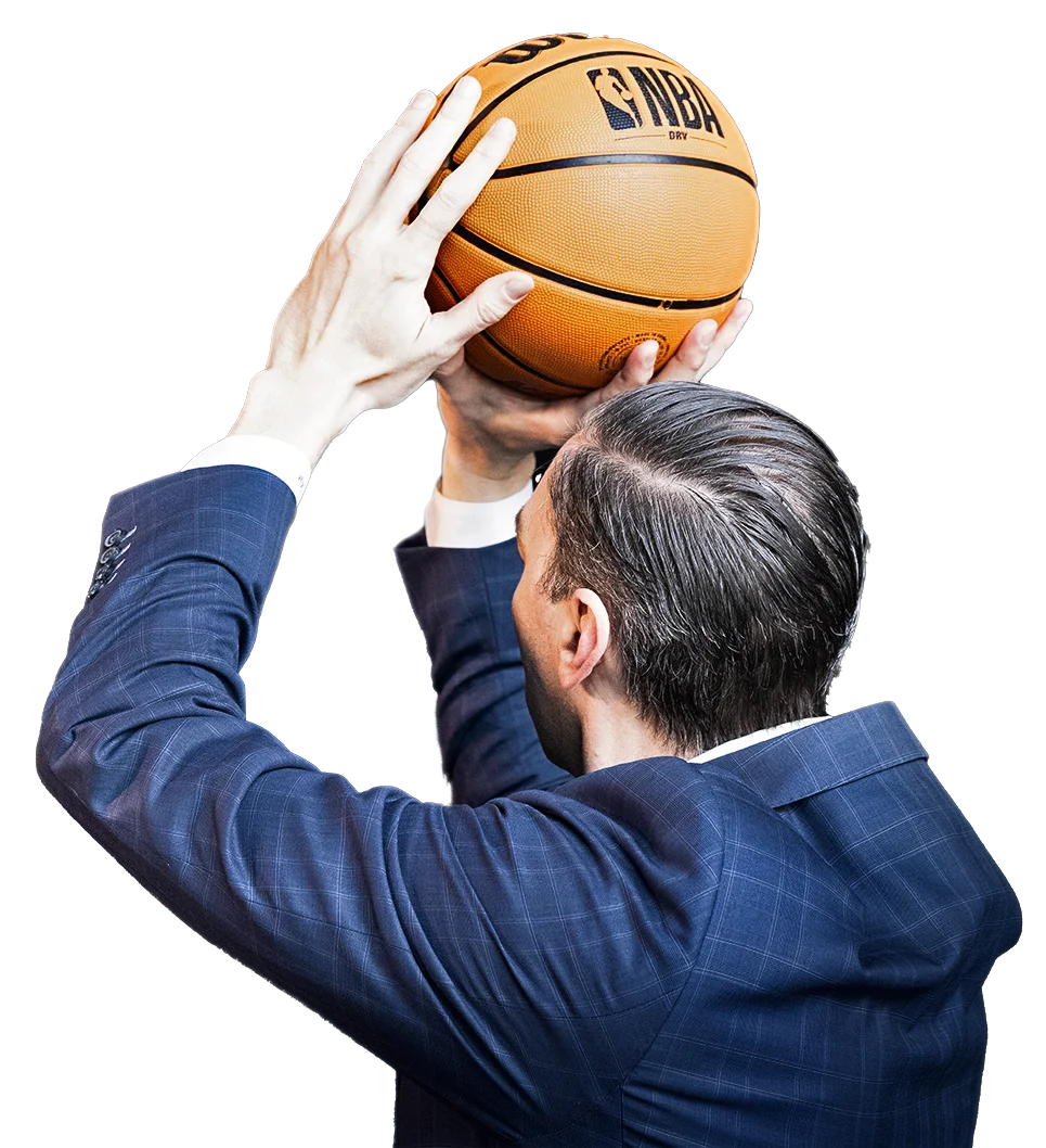 Attorney Charles Bennett holding basketball