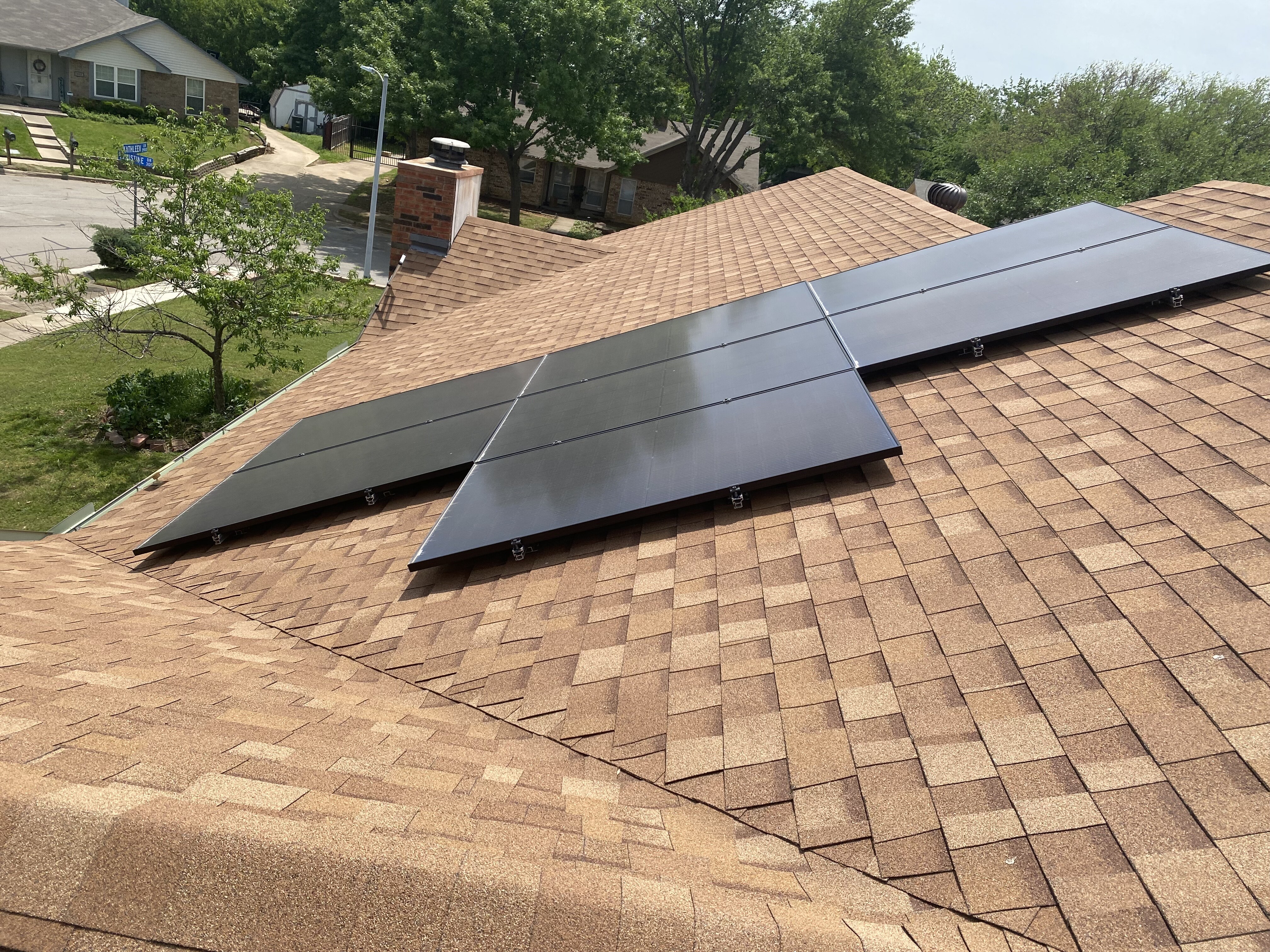 Solar panels installed on a residential roof in a disputed Sunlight Financial solar loan case