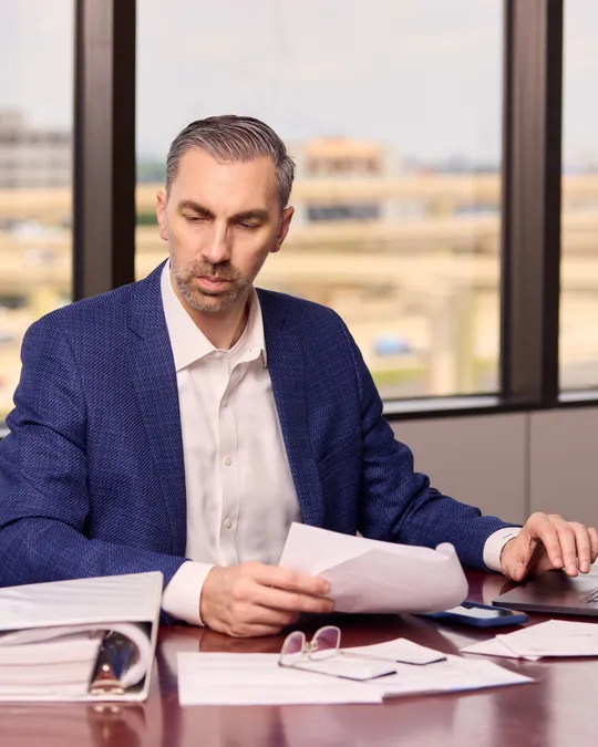Charles Bennett of Bennett Legal reviewing a solar contract